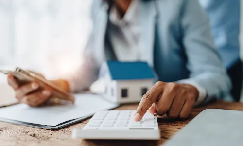 Can an Indian resident take a mortgage to buy a property in the UK or the UAE?